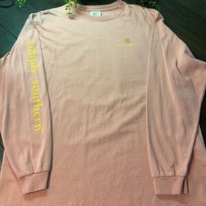 Simply Southern Womens Long Sleeve Shirt in Soft Pink with Yellow Logo.